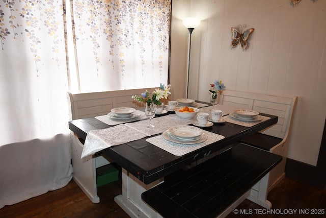 dining area featuring dark hardwood / wood-style flooring