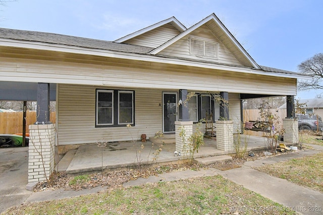 view of front of property featuring covered porch