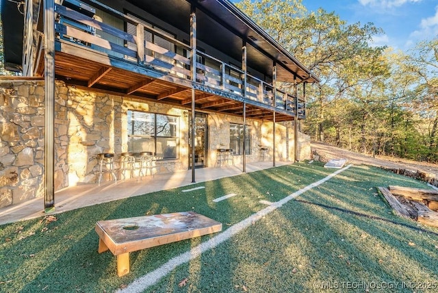 rear view of house with a patio area