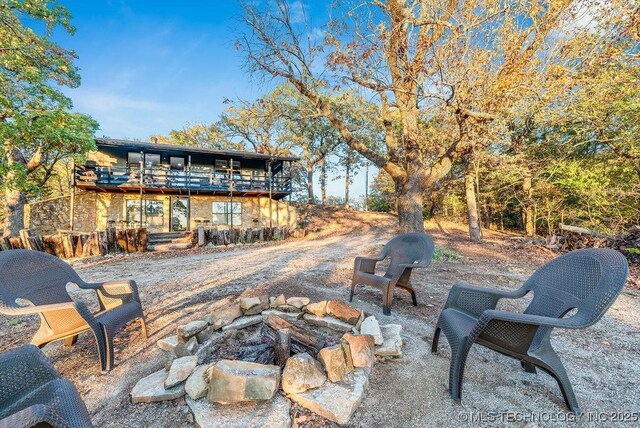 view of patio / terrace featuring a fire pit