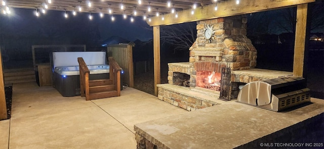 view of patio with a stone fireplace and a pergola