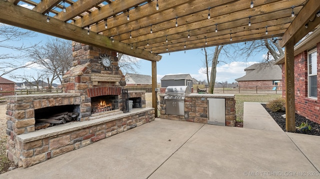 view of patio / terrace with grilling area, area for grilling, an outdoor stone fireplace, and a pergola