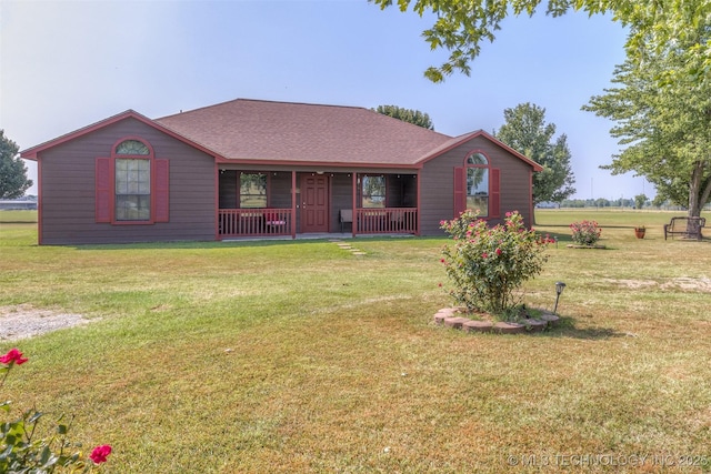 ranch-style home with covered porch and a front lawn