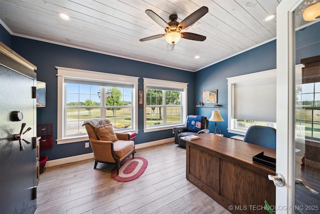 office space with crown molding and light hardwood / wood-style floors