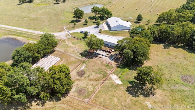 bird's eye view featuring a water view and a rural view