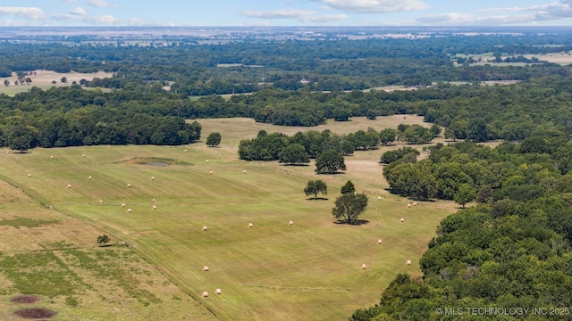 birds eye view of property featuring a rural view