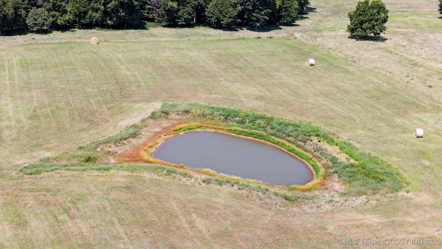 aerial view featuring a rural view and a water view