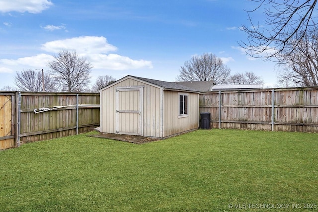 view of outbuilding featuring a lawn