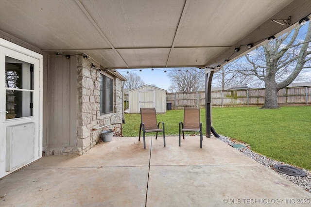 view of patio featuring a shed