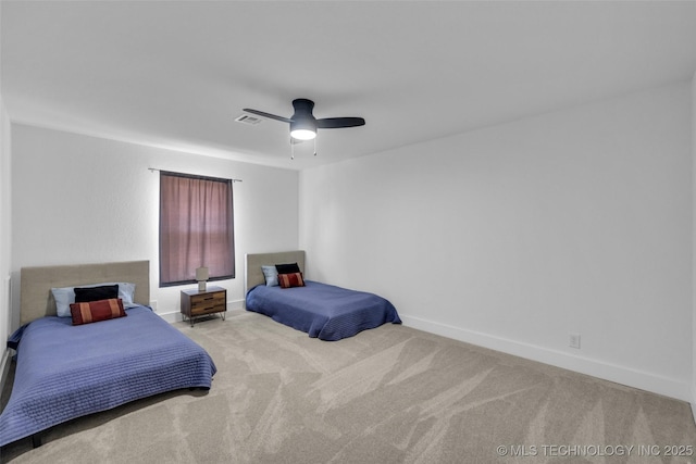 bedroom with light colored carpet and ceiling fan