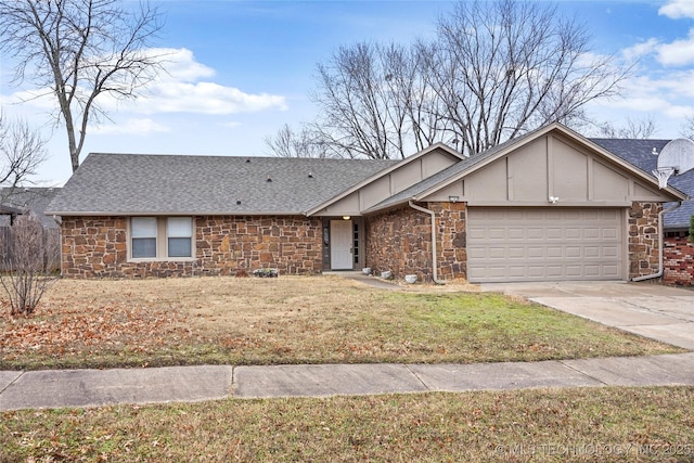 ranch-style home with a garage and a front yard