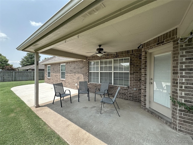 view of patio with ceiling fan