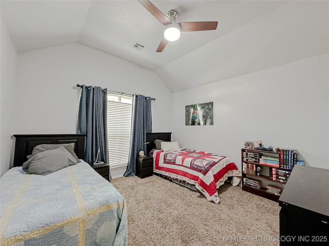 carpeted bedroom with lofted ceiling and ceiling fan