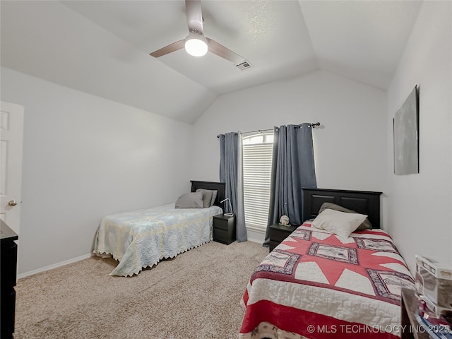 bedroom with lofted ceiling, carpet floors, and ceiling fan