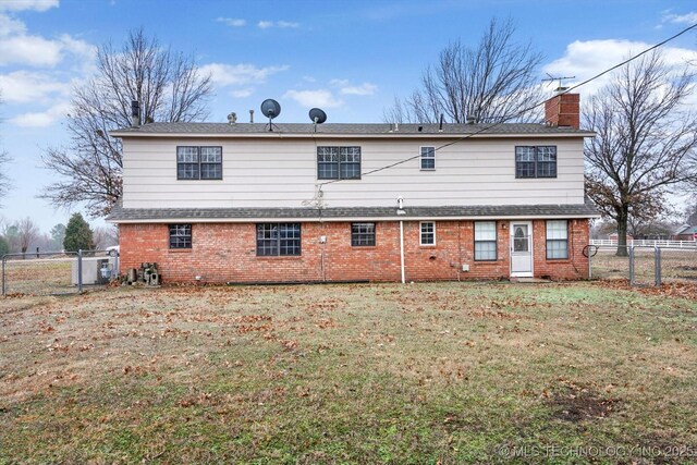 17121 E 120th St, Collinsville, OK 74021 - back of house featuring brick siding, a chimney, and a shingled roof