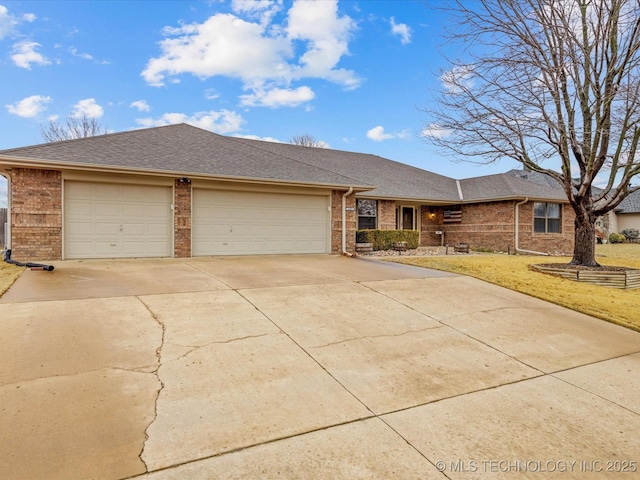 ranch-style home with a garage and a front yard