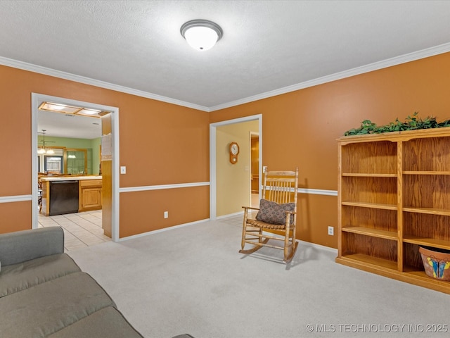 interior space featuring ornamental molding, light carpet, and a textured ceiling