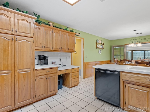 kitchen featuring sink, an inviting chandelier, decorative light fixtures, light tile patterned floors, and black dishwasher