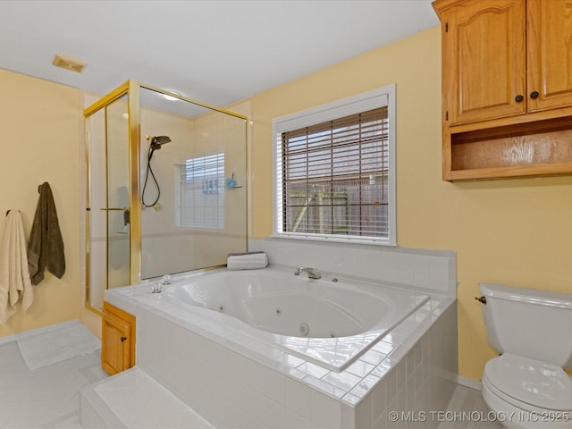 bathroom with toilet and separate shower and tub