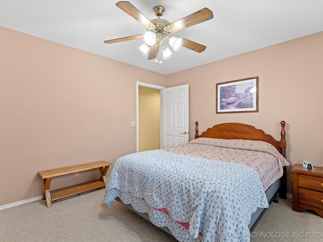 bedroom featuring ceiling fan and carpet flooring