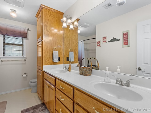 bathroom featuring tile patterned floors, vanity, toilet, and a shower with shower curtain