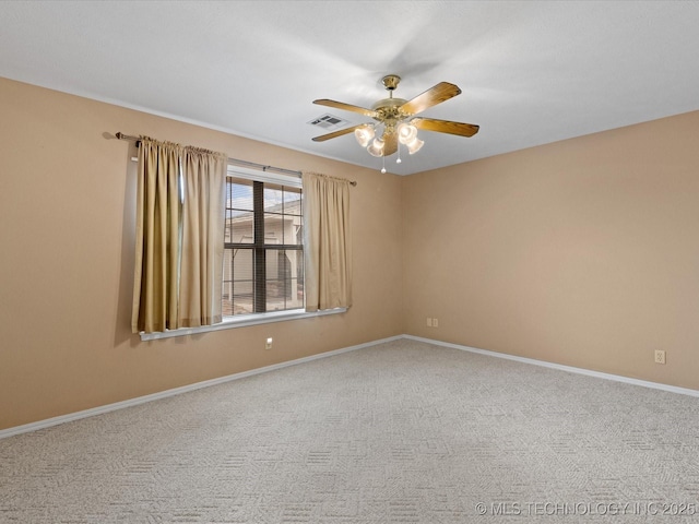 carpeted empty room with ceiling fan