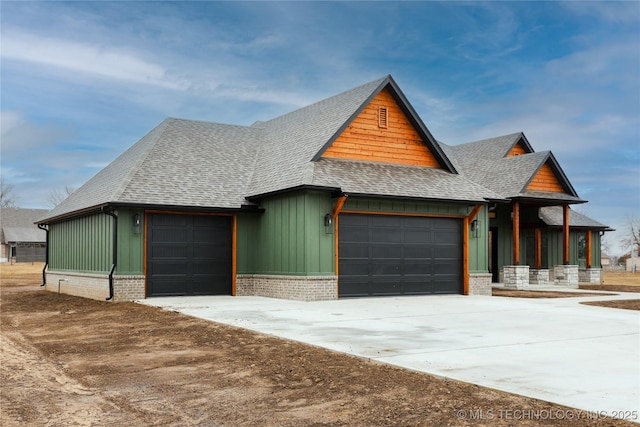 view of front of property featuring a porch and a garage