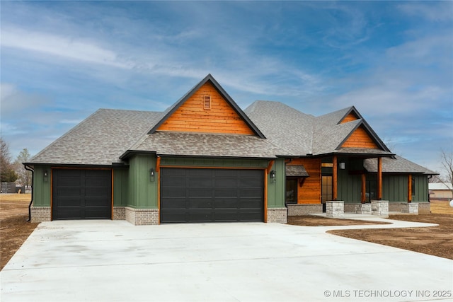 view of front of property featuring a garage and covered porch