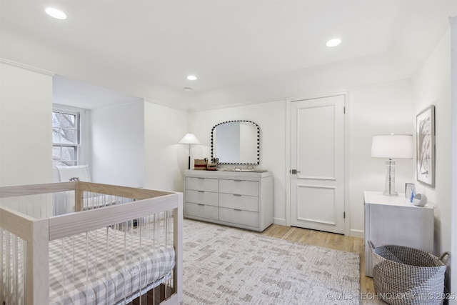 bedroom featuring light hardwood / wood-style floors