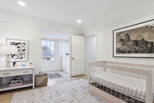 bedroom featuring light wood-type flooring