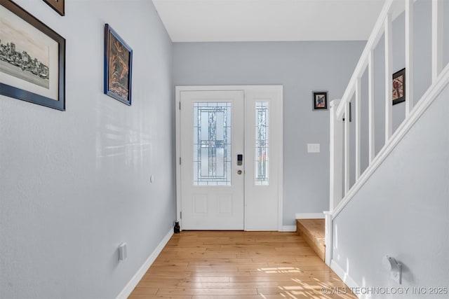 entrance foyer with light wood-type flooring