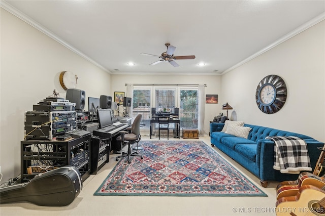 office space with crown molding, ceiling fan, and carpet floors