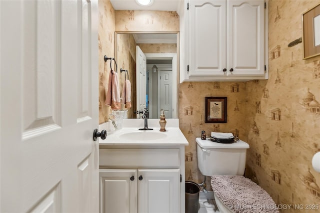 bathroom with vanity and toilet