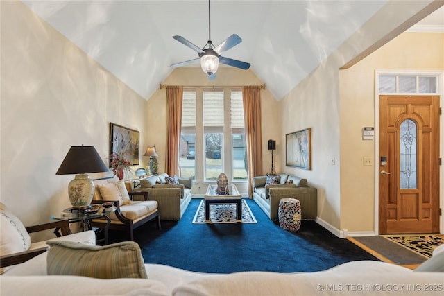 living room featuring lofted ceiling, ceiling fan, and dark colored carpet