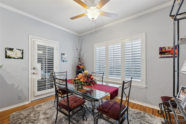 dining area with ornamental molding, hardwood / wood-style floors, and ceiling fan