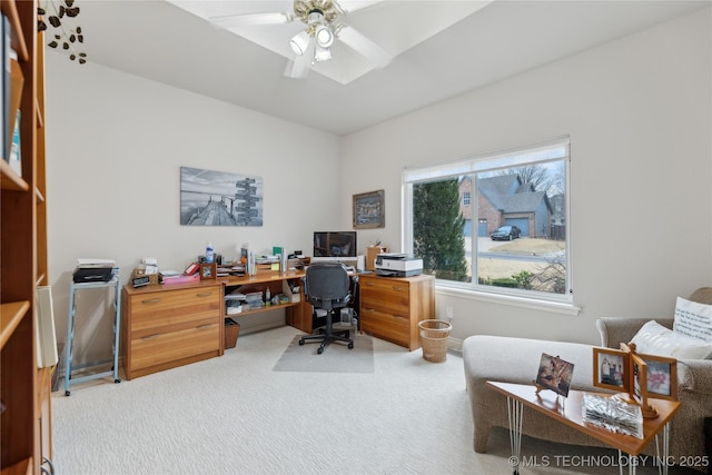 office with carpet floors and ceiling fan