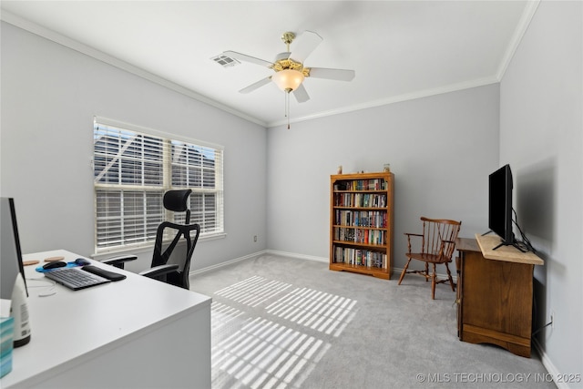 carpeted home office with ornamental molding and ceiling fan