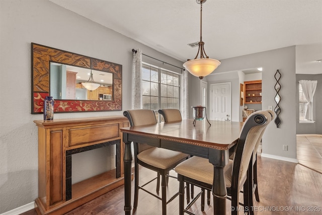 dining room featuring hardwood / wood-style floors