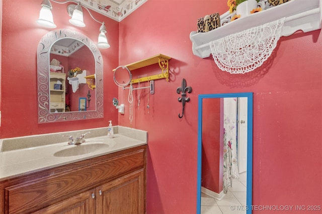 bathroom with tile patterned floors and vanity