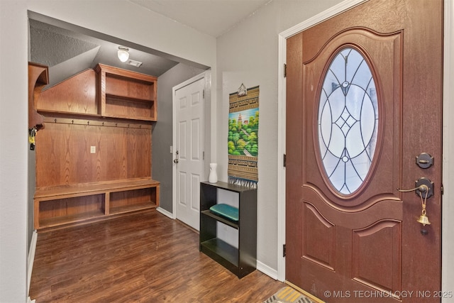 entryway with dark hardwood / wood-style floors