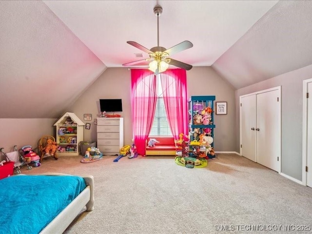 bedroom featuring ceiling fan, lofted ceiling, and carpet floors