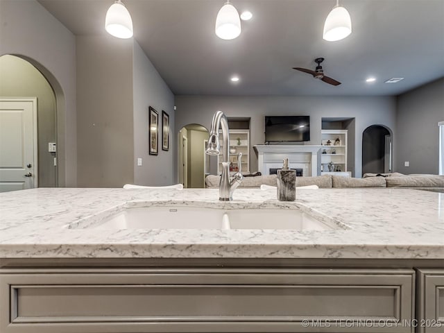 bathroom with vanity and ceiling fan