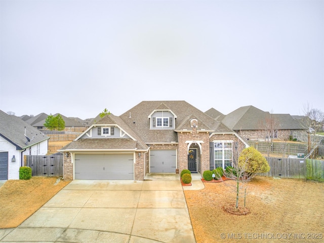 view of front of home with a garage