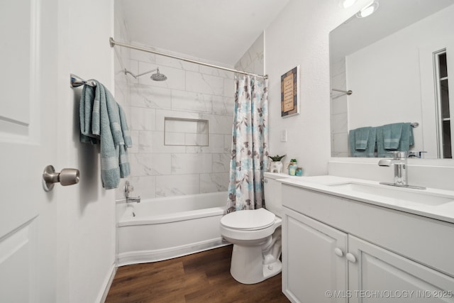 full bathroom with shower / tub combo with curtain, vanity, toilet, and hardwood / wood-style floors