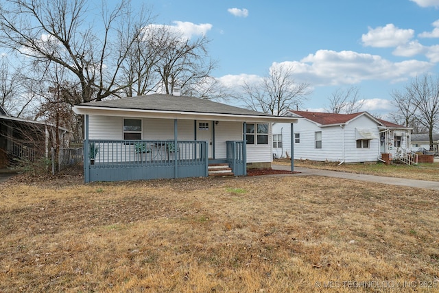 view of front of home featuring a front lawn and covered porch