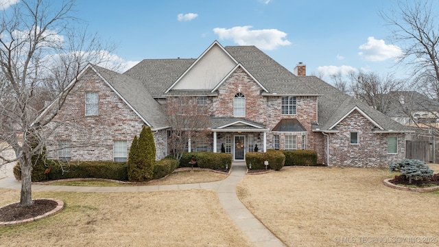 view of property featuring a front yard