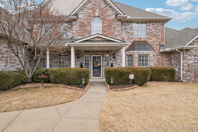 view of front property with a front lawn