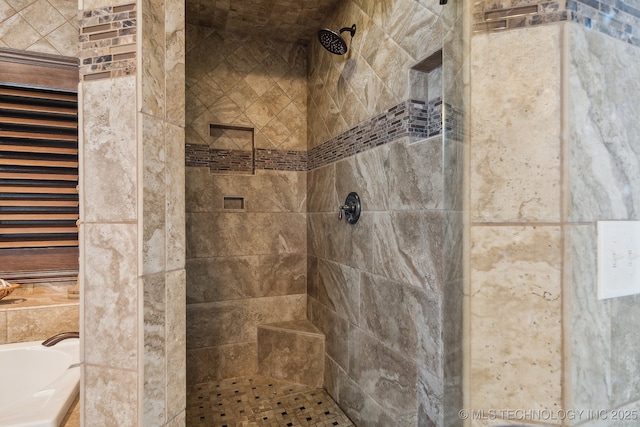 bathroom featuring separate shower and tub