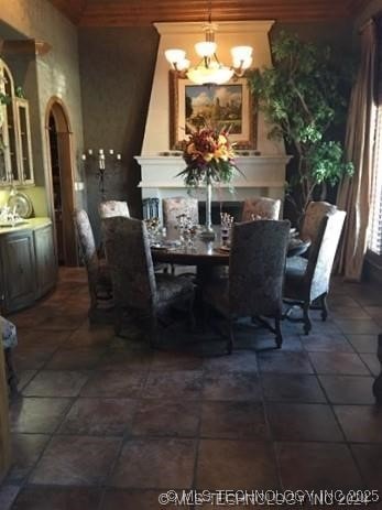 dining room featuring a notable chandelier