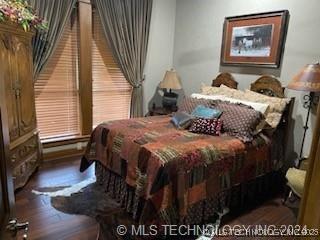 bedroom featuring dark hardwood / wood-style floors